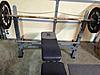 Olympic weight bench with barbell and weights-image.jpg
